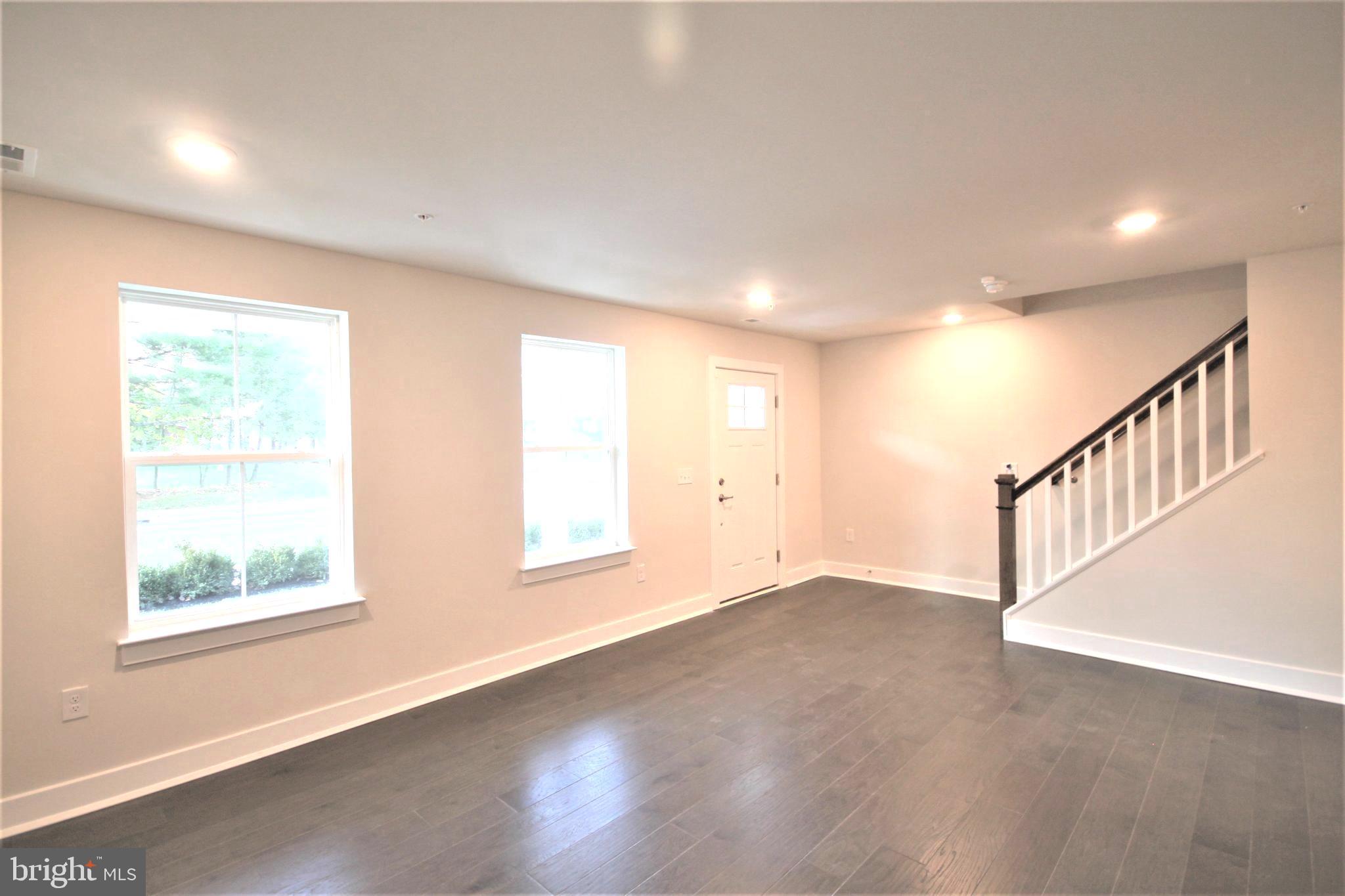 4856 Stump Road Pipersville, PA 18947 - Photo 2 of 35 an empty room with windows