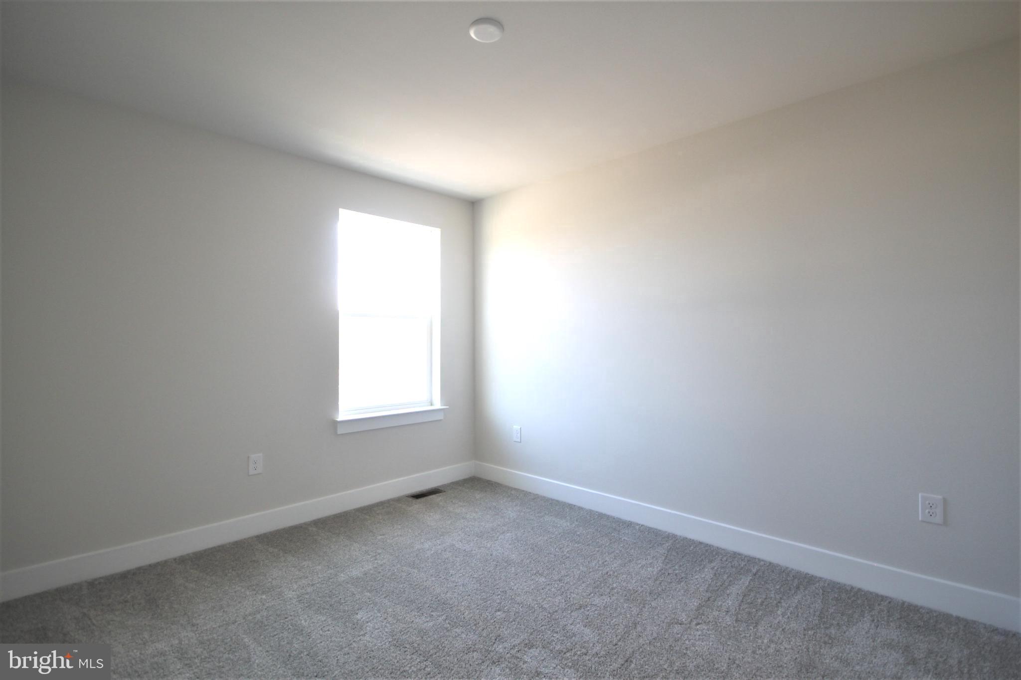 4856 Stump Road Pipersville, PA 18947 - Photo 21 of 35 an empty room with a window