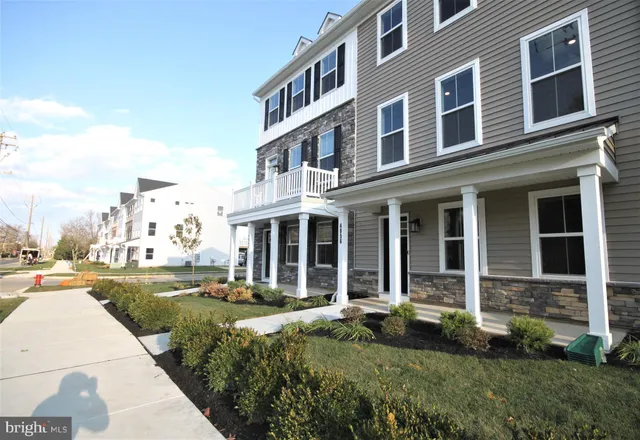 a view of a building with a yard