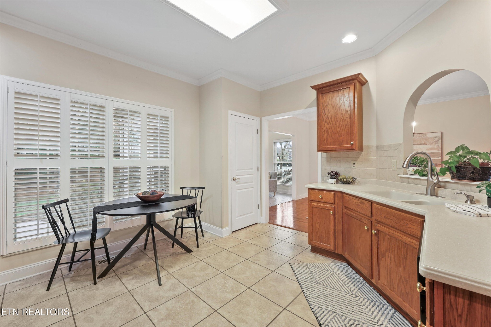 316 English Station Road Knoxville, TN 37934 - Photo 14 of 45 a view of a kitchen with a table and chairs