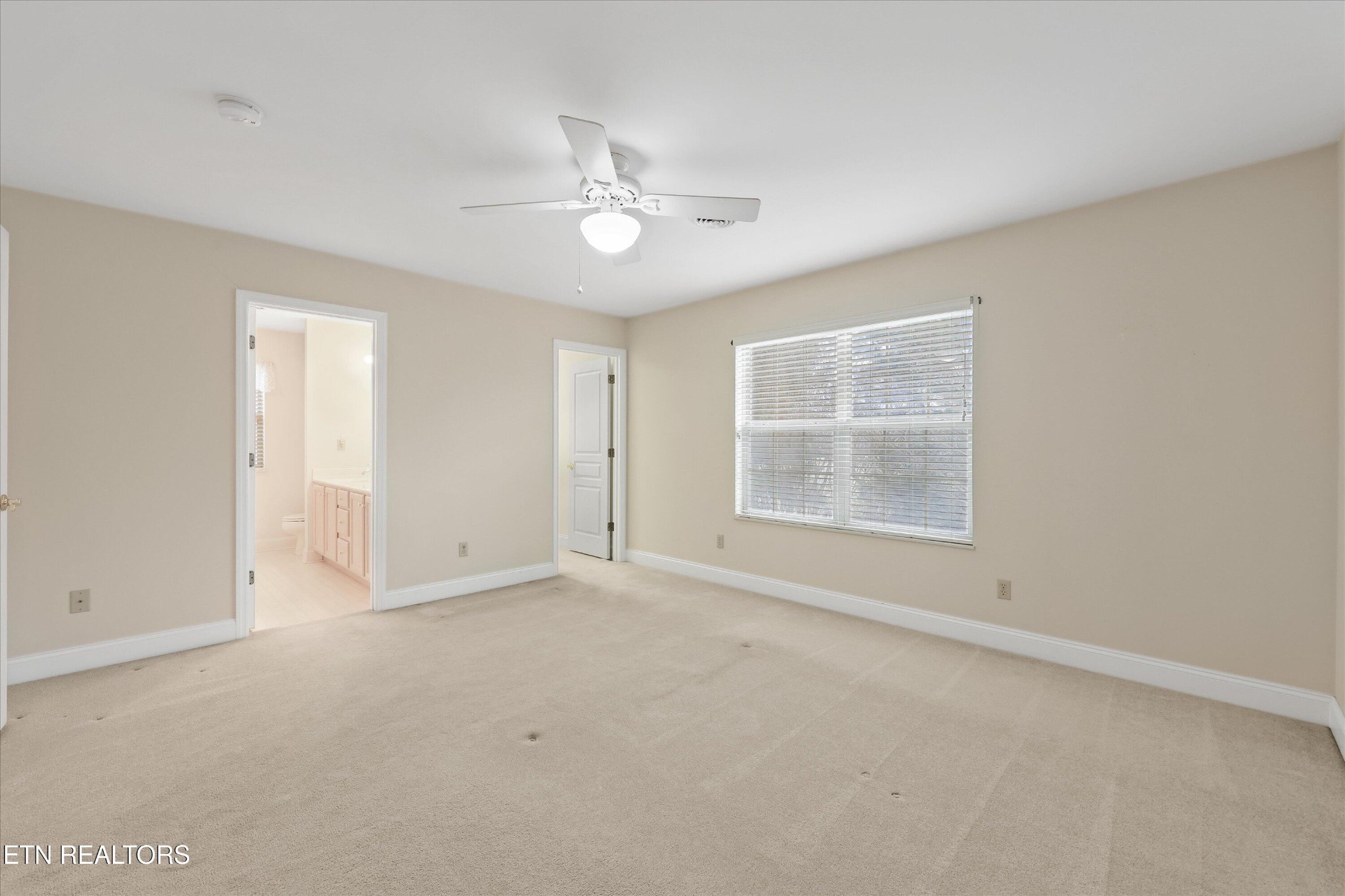 316 English Station Road Knoxville, TN 37934 - Photo 27 of 45 a view of an empty room with a window