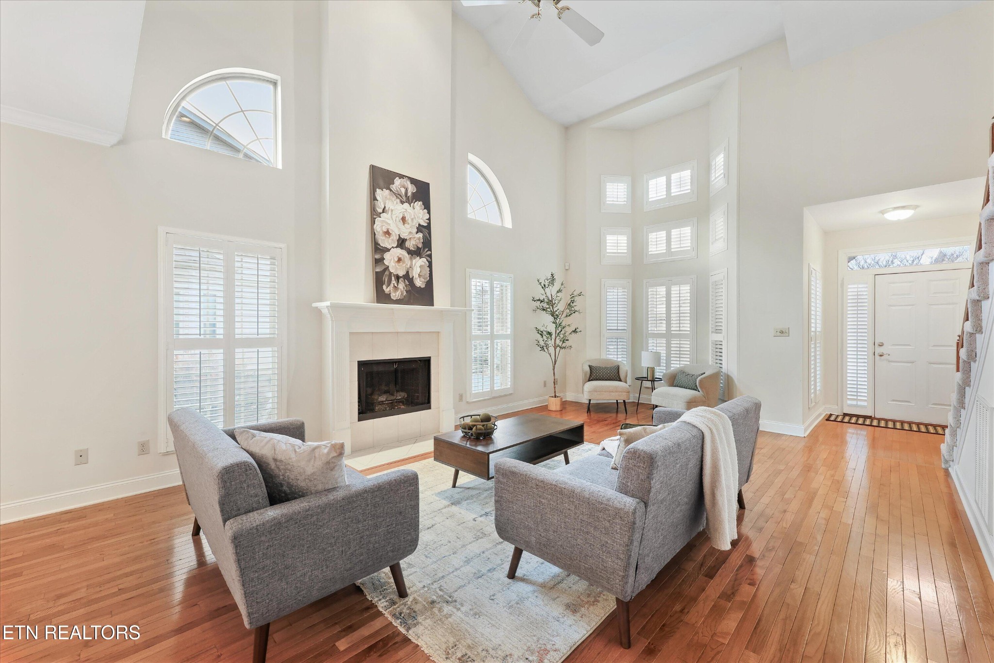 316 English Station Road Knoxville, TN 37934 - Photo 5 of 45 a living room with furniture fireplace and wooden floor