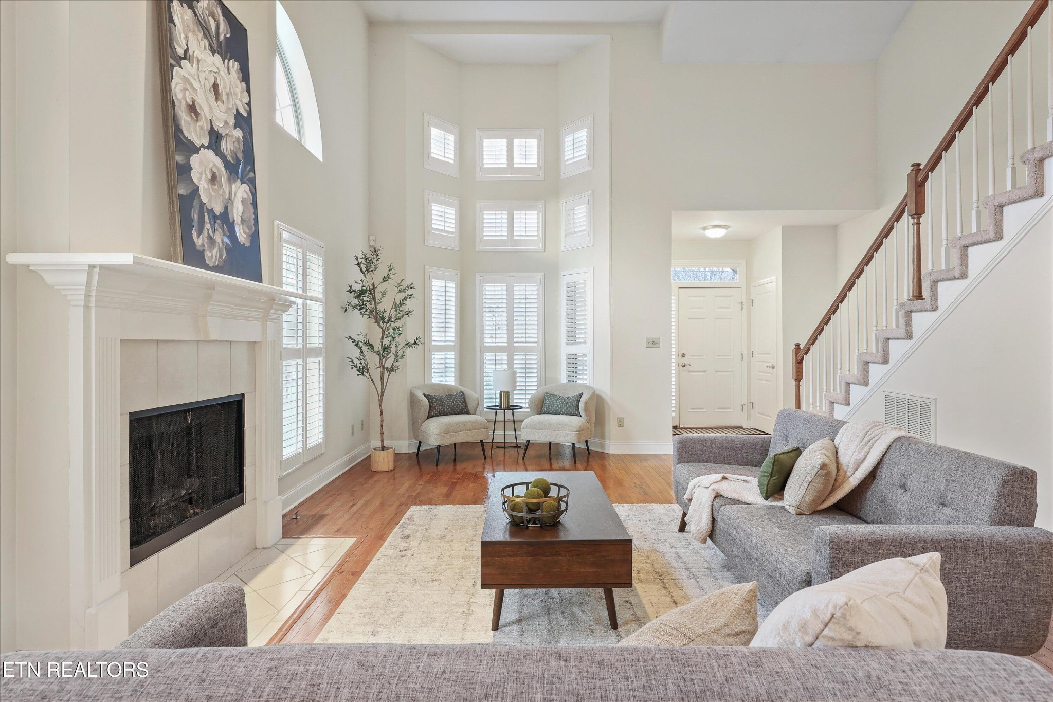 316 English Station Road Knoxville, TN 37934 - Photo 7 of 45 a living room with furniture and a fireplace