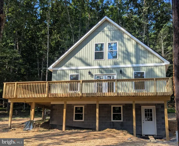 a view of a house with a roof deck