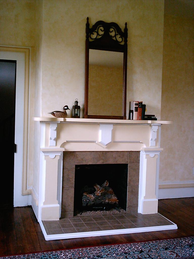 2236 Dillons Mill Road Callaway, VA 24067 - Photo 14 of 20 a living room with a fireplace and a wooden floor