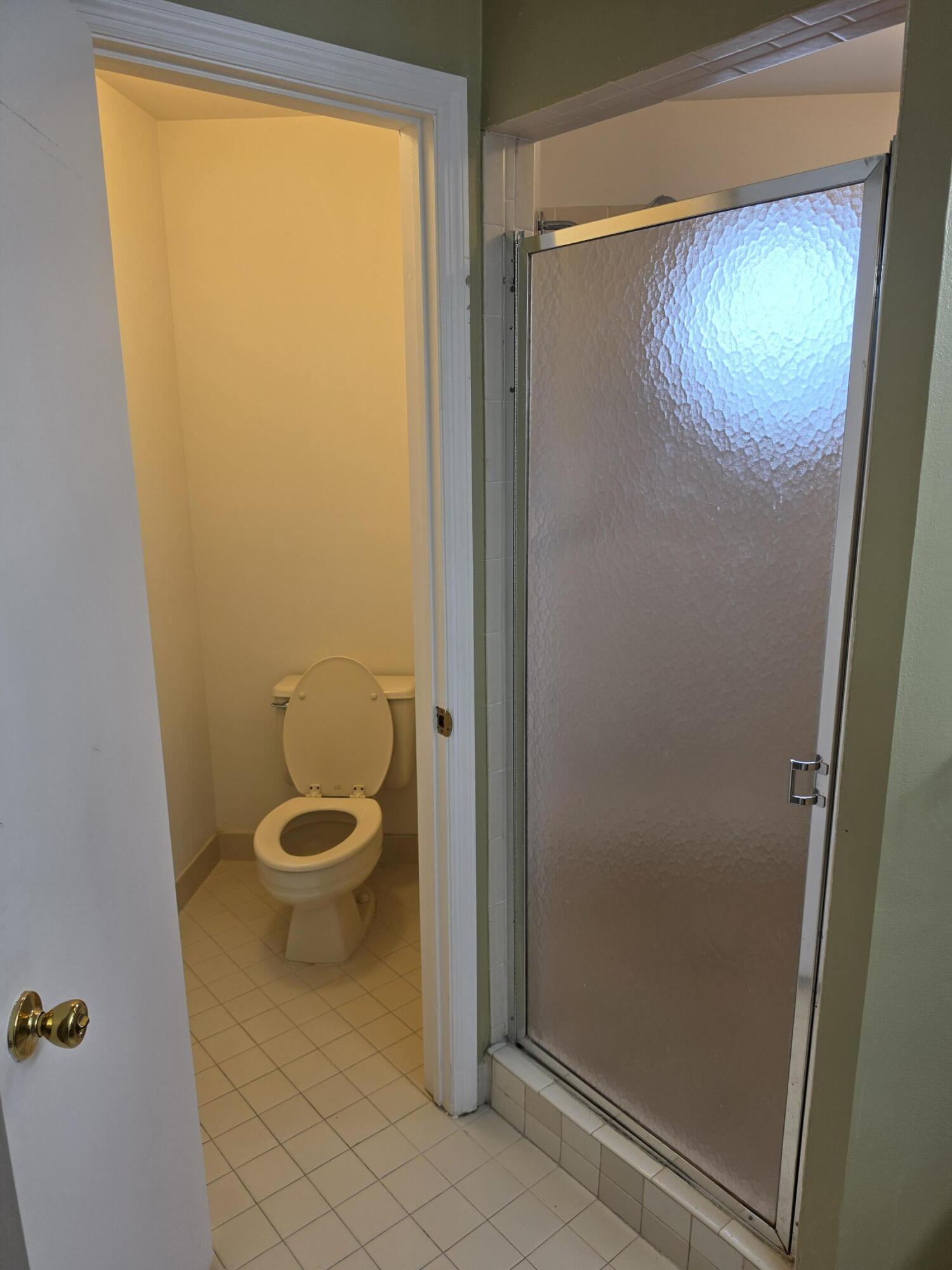 6584 Via Regina Boca Raton, FL 33433 - Photo 19 of 24 6584 VIA REGINA - MASTER SHOWER & TOILET