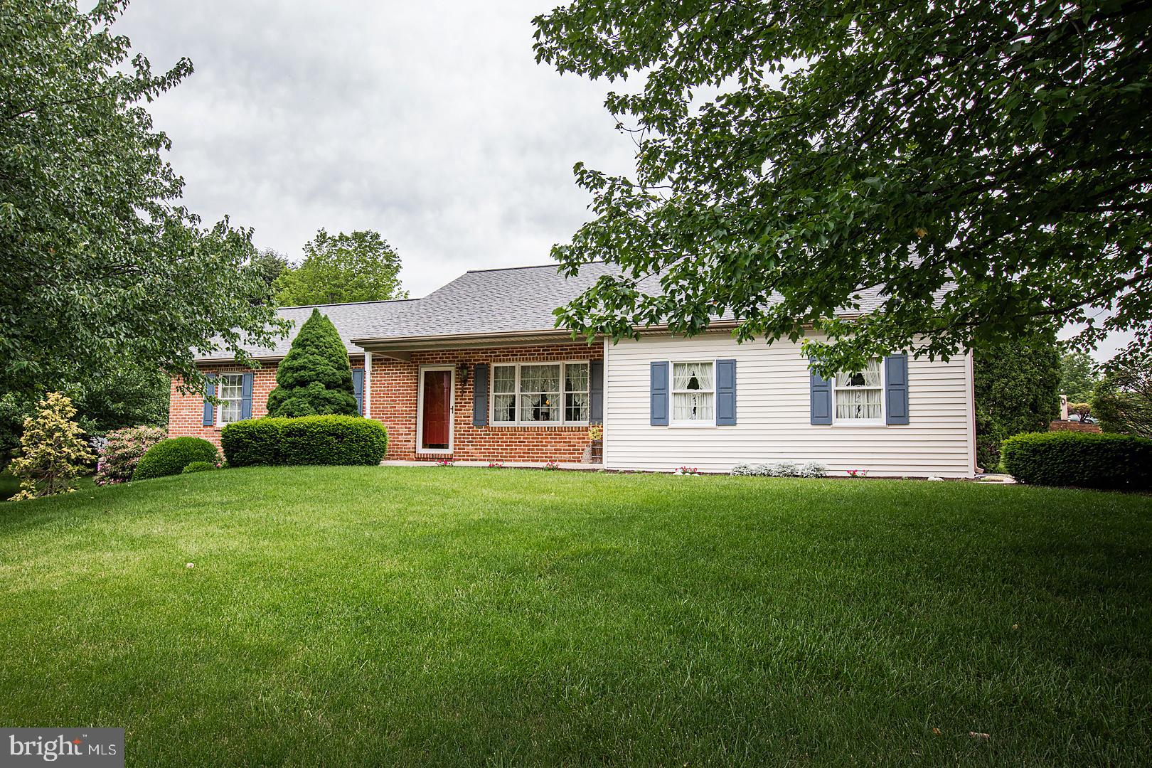 1 Hurst Boulevard Lititz, PA 17543 - Photo 1 of 62 a front view of a house with a garden