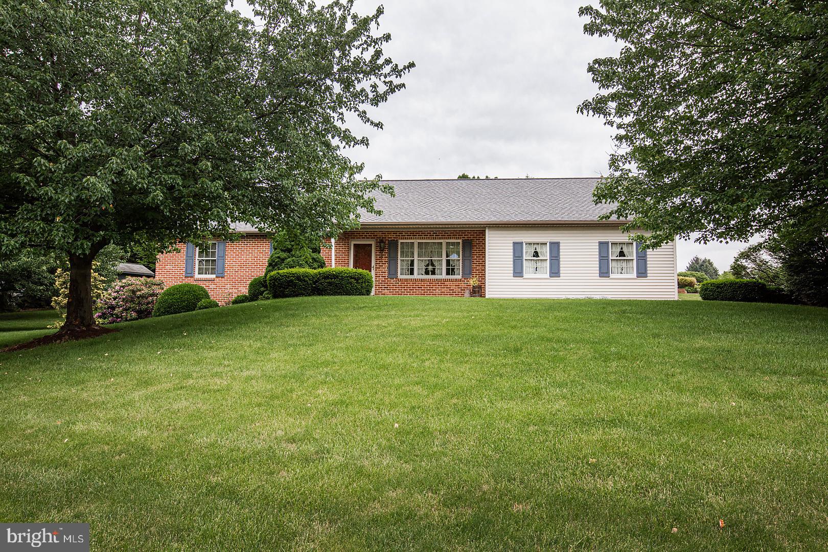 1 Hurst Boulevard Lititz, PA 17543 - Photo 2 of 62 a front view of house with yard and trees