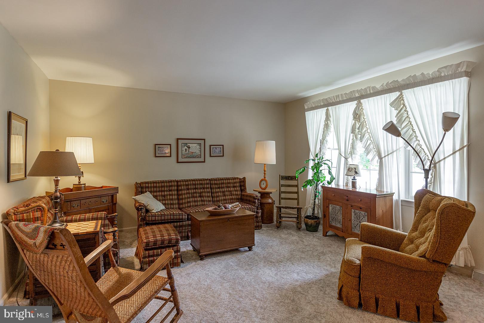 1 Hurst Boulevard Lititz, PA 17543 - Photo 12 of 62 a living room with furniture and a lamp