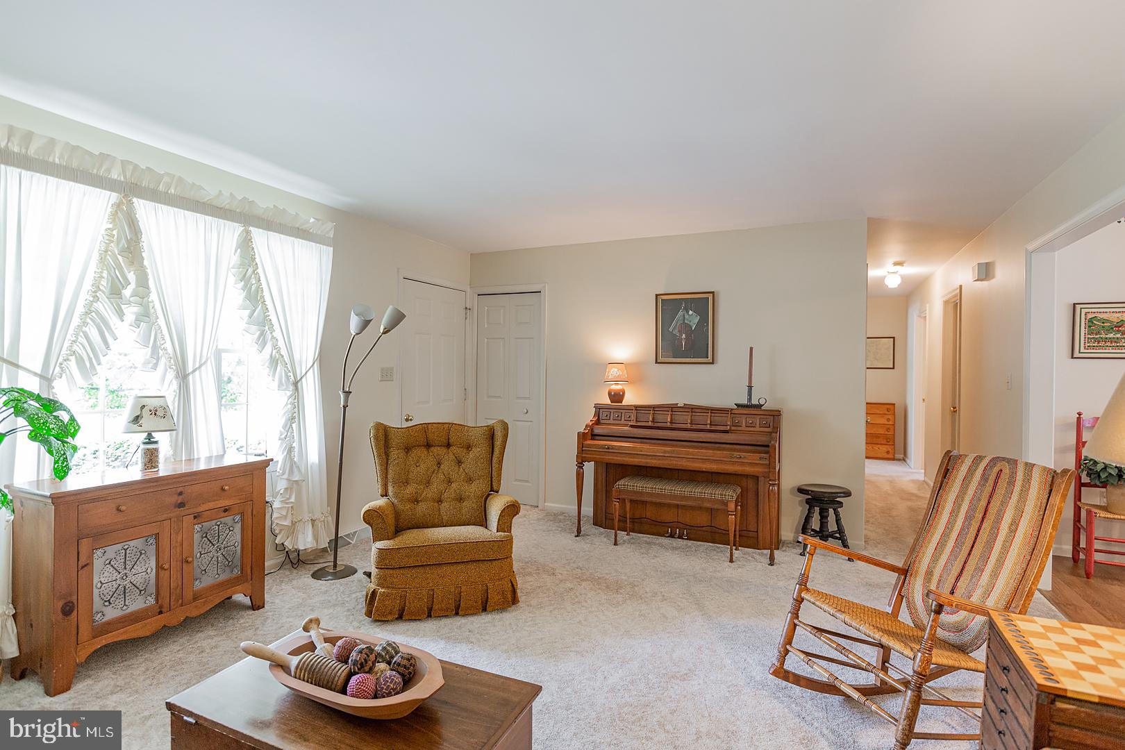 1 Hurst Boulevard Lititz, PA 17543 - Photo 13 of 62 a living room with furniture and a fireplace