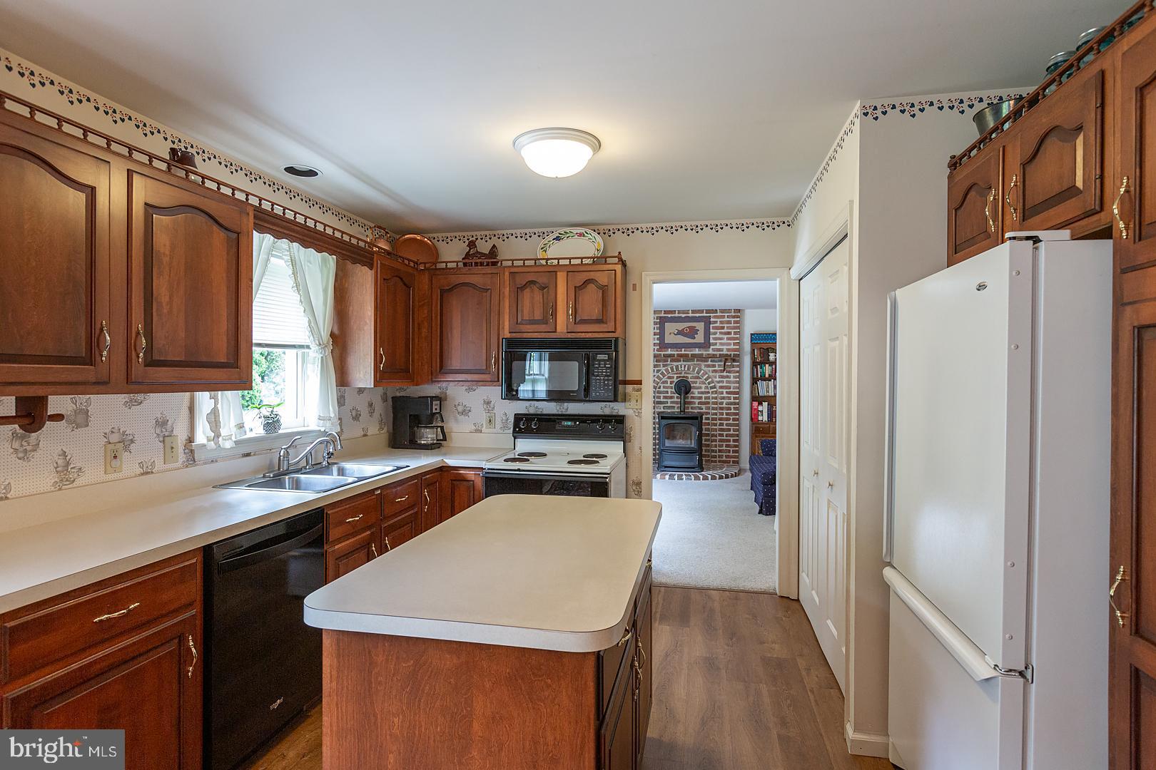 1 Hurst Boulevard Lititz, PA 17543 - Photo 20 of 62 a kitchen with a refrigerator a sink and cabinets