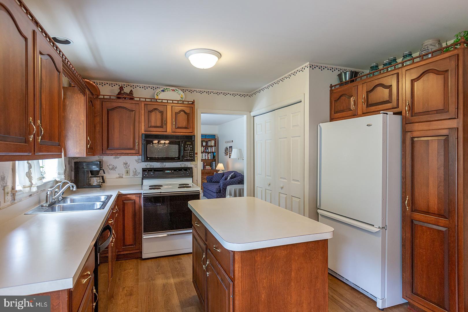 1 Hurst Boulevard Lititz, PA 17543 - Photo 22 of 62 a kitchen with a refrigerator a stove a sink and a refrigerator