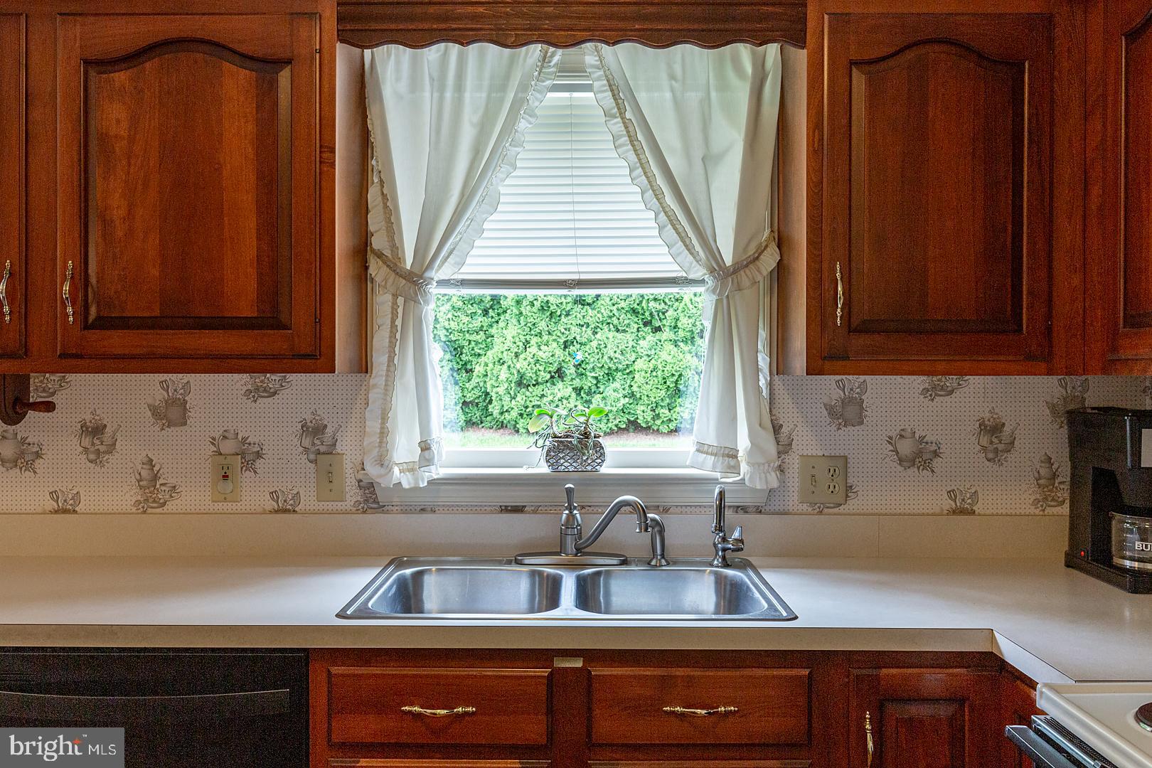 1 Hurst Boulevard Lititz, PA 17543 - Photo 24 of 62 a kitchen with a sink a window and cabinets