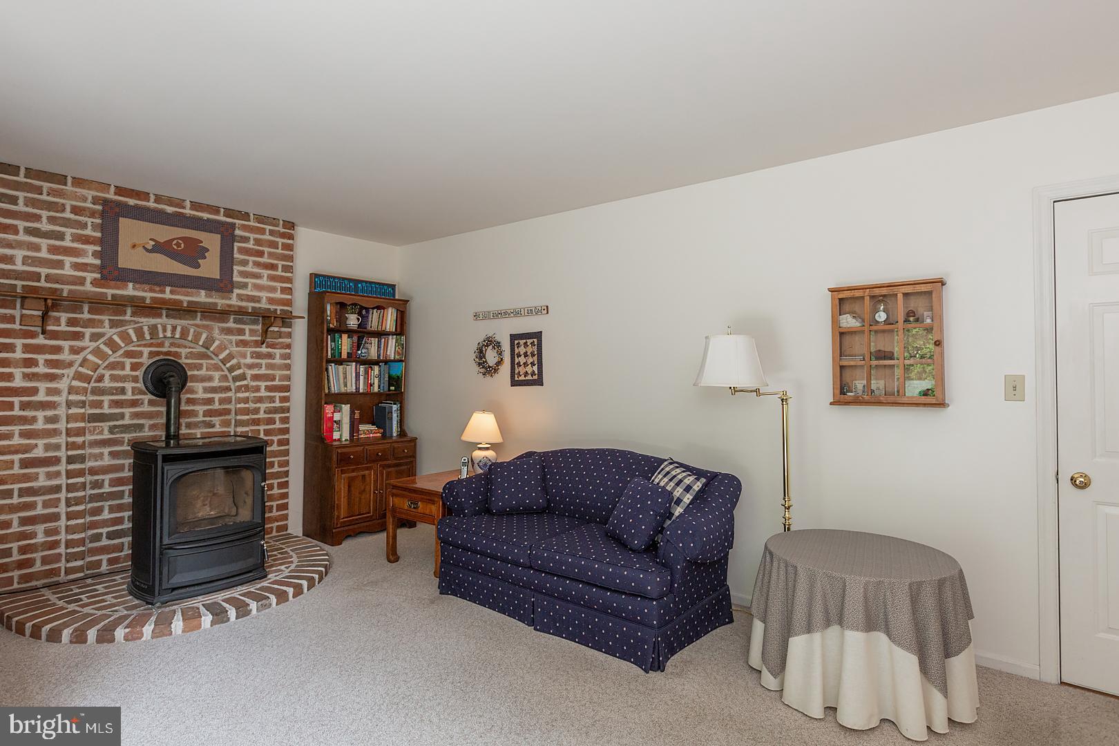 1 Hurst Boulevard Lititz, PA 17543 - Photo 29 of 62 a living room with furniture and a fireplace