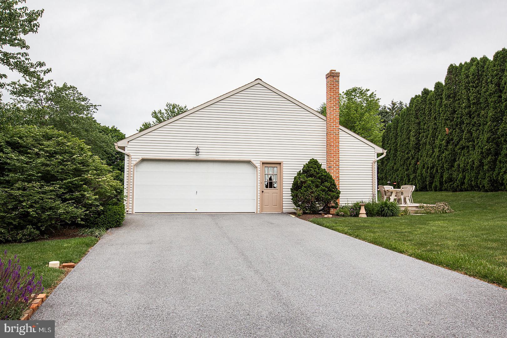 1 Hurst Boulevard Lititz, PA 17543 - Photo 4 of 62 a view of a house with a yard and garage