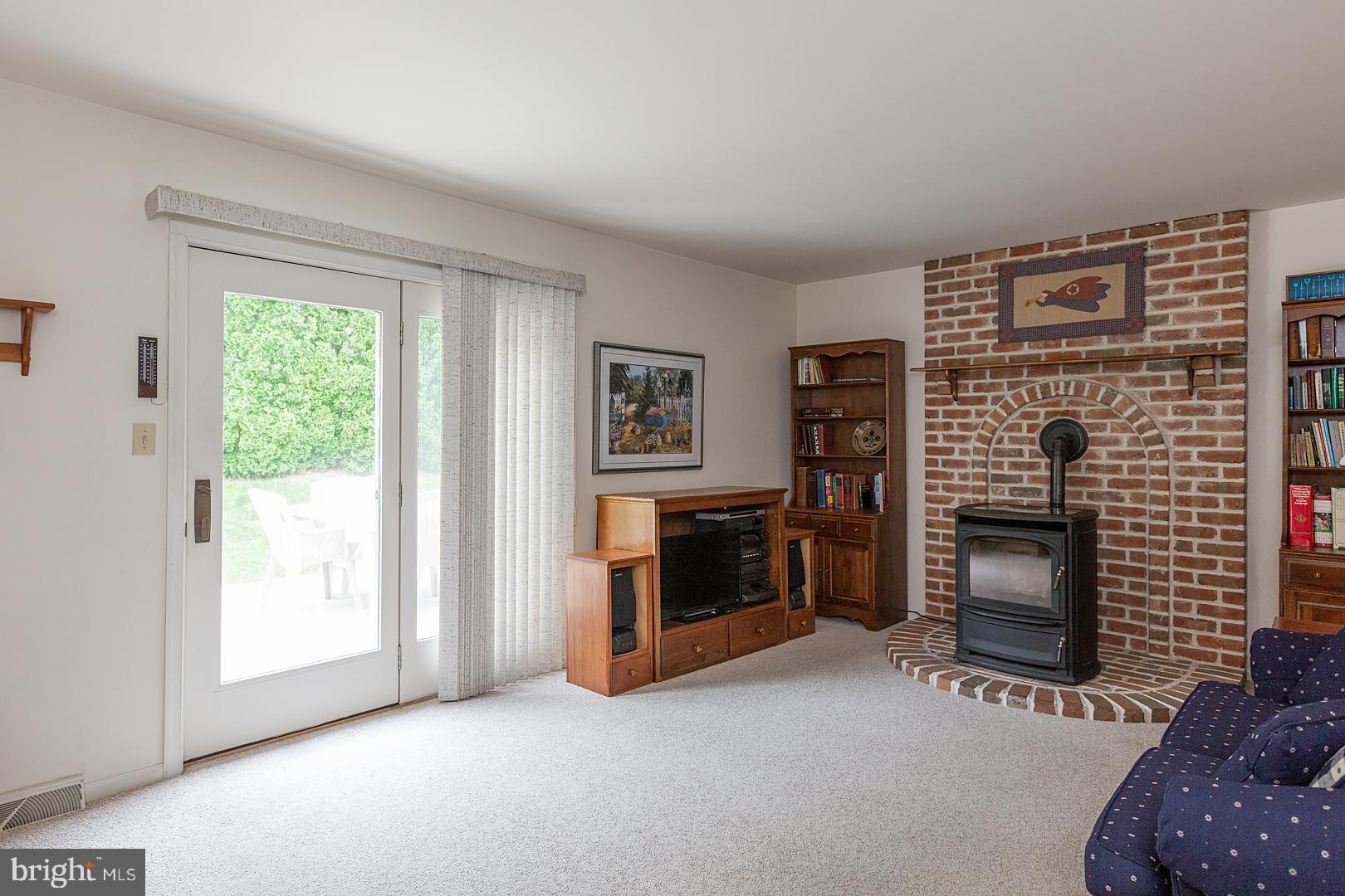 1 Hurst Boulevard Lititz, PA 17543 - Photo 31 of 62 a view of a livingroom with furniture and a fireplace