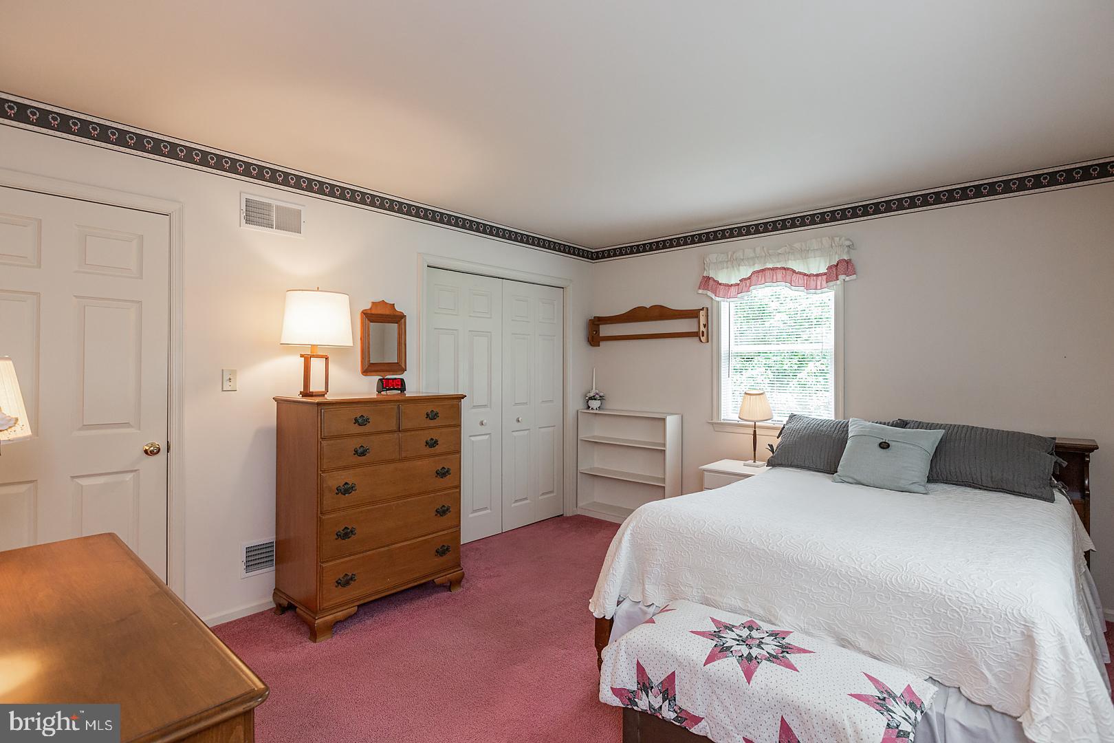 1 Hurst Boulevard Lititz, PA 17543 - Photo 33 of 62 a bedroom with a bed and a dresser