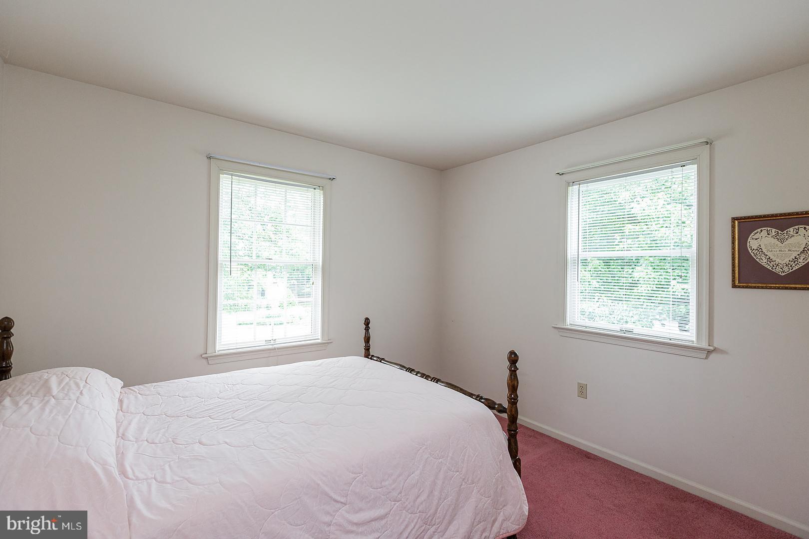 1 Hurst Boulevard Lititz, PA 17543 - Photo 36 of 62 a bed sitting in a bedroom next to a window