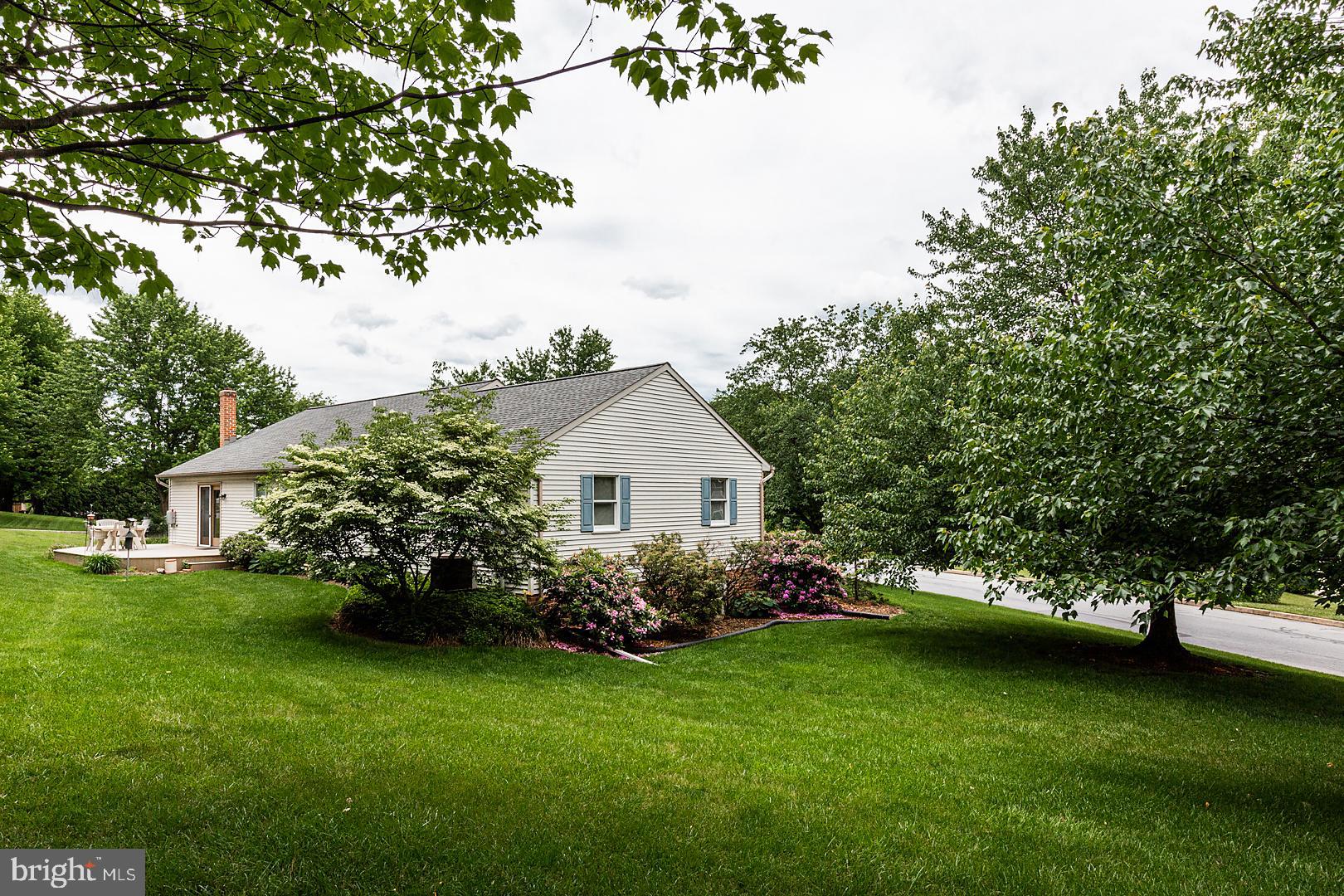 1 Hurst Boulevard Lititz, PA 17543 - Photo 5 of 62 a front view of a house with garden