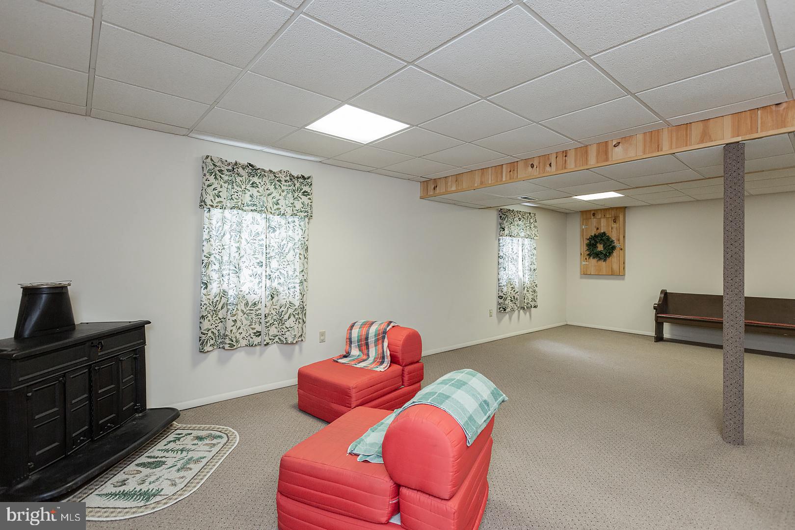 1 Hurst Boulevard Lititz, PA 17543 - Photo 44 of 62 a living room with furniture a flat screen tv and a window