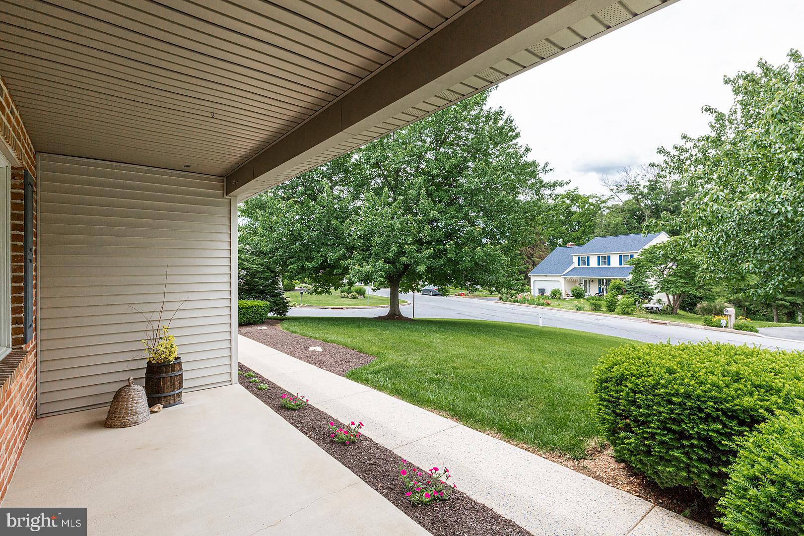 1 Hurst Boulevard Lititz, PA 17543 - Photo 9 of 62 a view of a porch with a garden