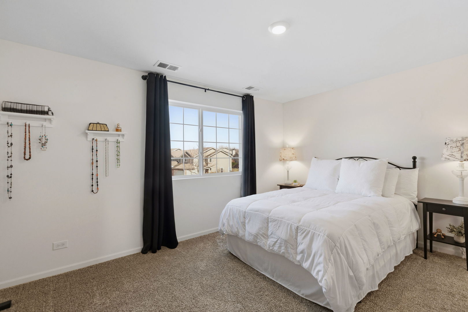 717 Wellington Lane Cary, IL 60013 - Photo 14 of 28 a bedroom with a bed and a window