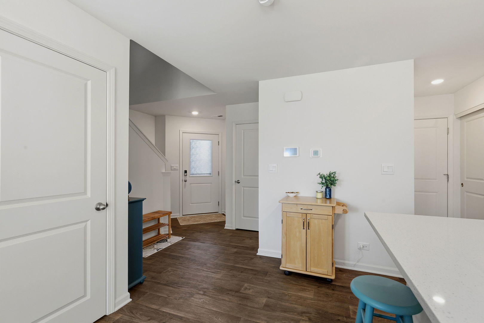 717 Wellington Lane Cary, IL 60013 - Photo 2 of 28 a view of an empty room and wooden floor