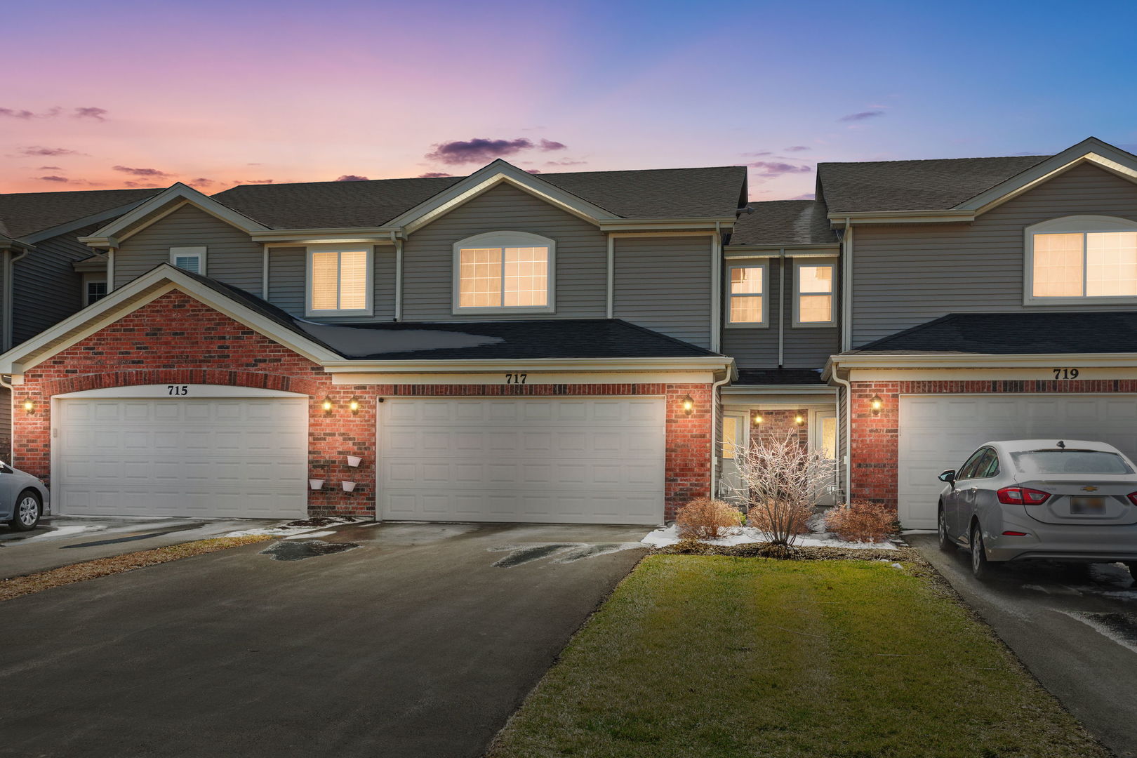 717 Wellington Lane Cary, IL 60013 - Photo 28 of 28 a front view of a house with a yard