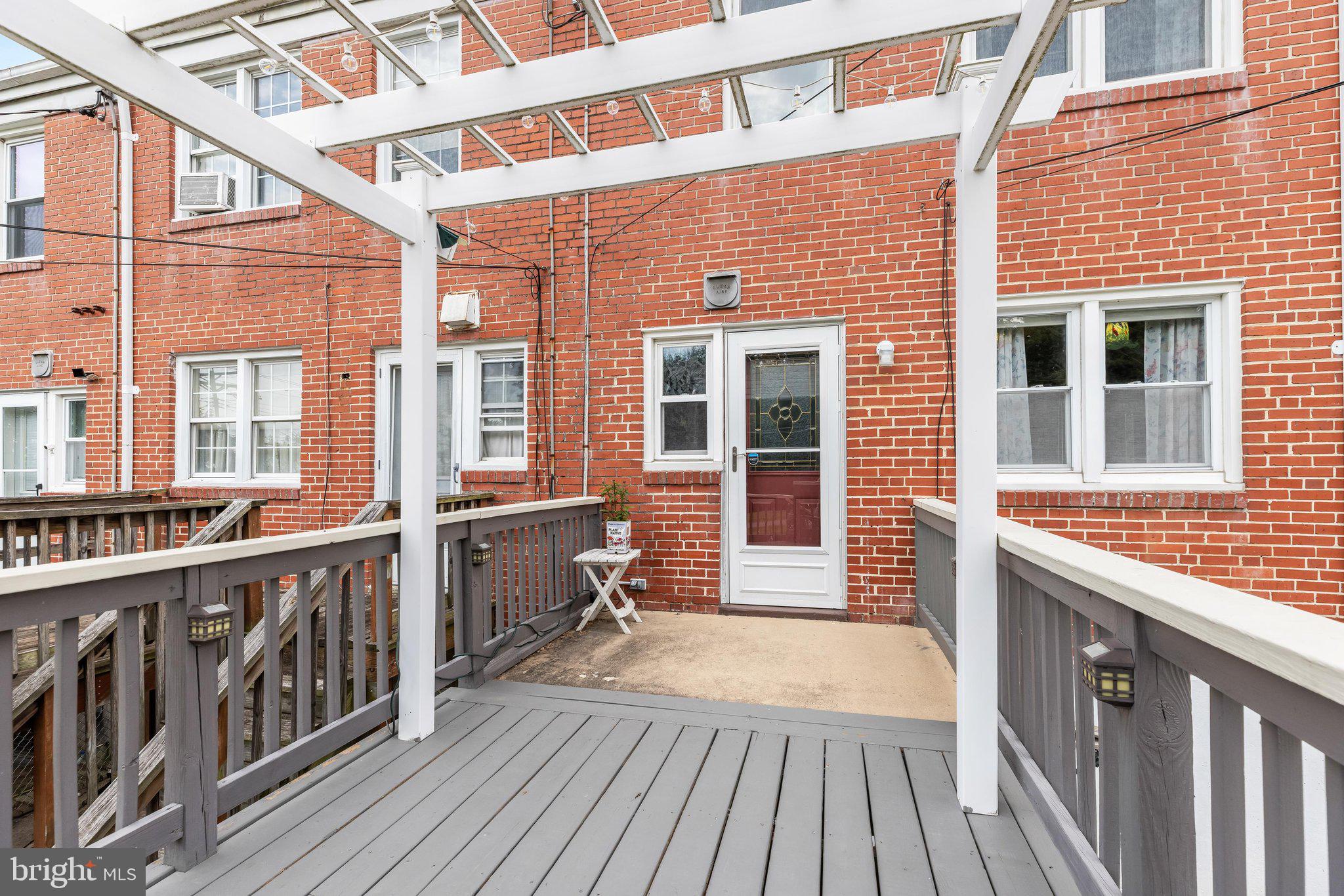 309 Leeanne Road Baltimore, MD 21221 - Photo 17 of 42 Deck with Pergola off Kitchen