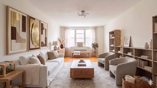 a living room with furniture or couch and a large window