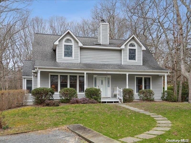 9 Roses Grove Road Southampton, NY 11968 - Photo 1 of 1 a front view of a house with garden