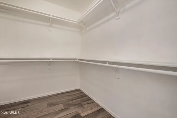 a view of an empty walk in closet