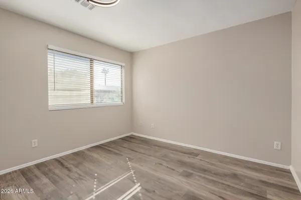 a view of a room that has a window in it