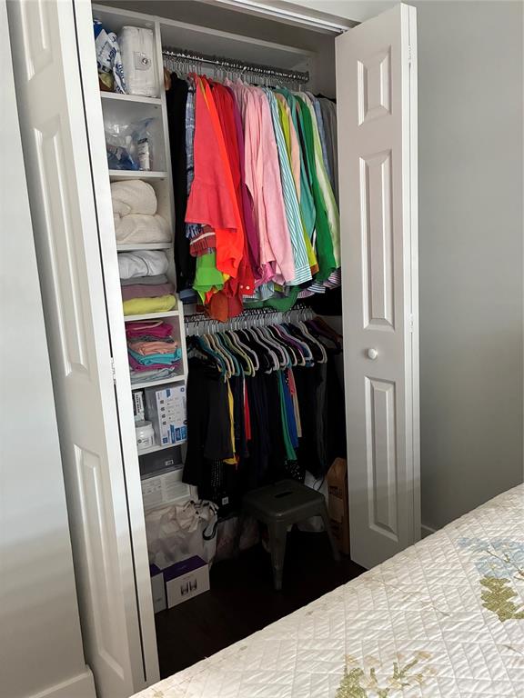 18546 Horizon Avenue, Unit 168 Boca Raton, FL 33496 - Photo 17 of 46 a view of walk in closet with clothes and shoes