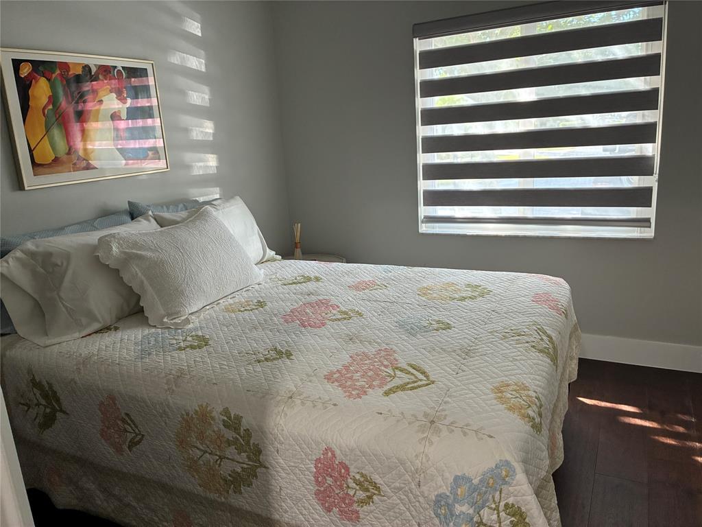 18546 Horizon Avenue, Unit 168 Boca Raton, FL 33496 - Photo 18 of 46 a bedroom with a bed and a window