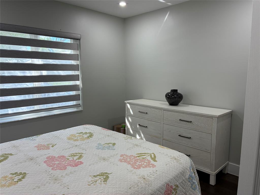 18546 Horizon Avenue, Unit 168 Boca Raton, FL 33496 - Photo 19 of 46 a bedroom with a bed and a window