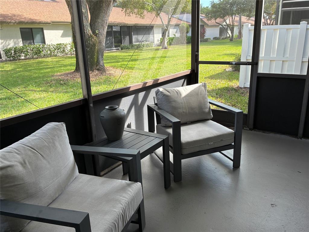 18546 Horizon Avenue, Unit 168 Boca Raton, FL 33496 - Photo 29 of 46 a view of a patio with garden