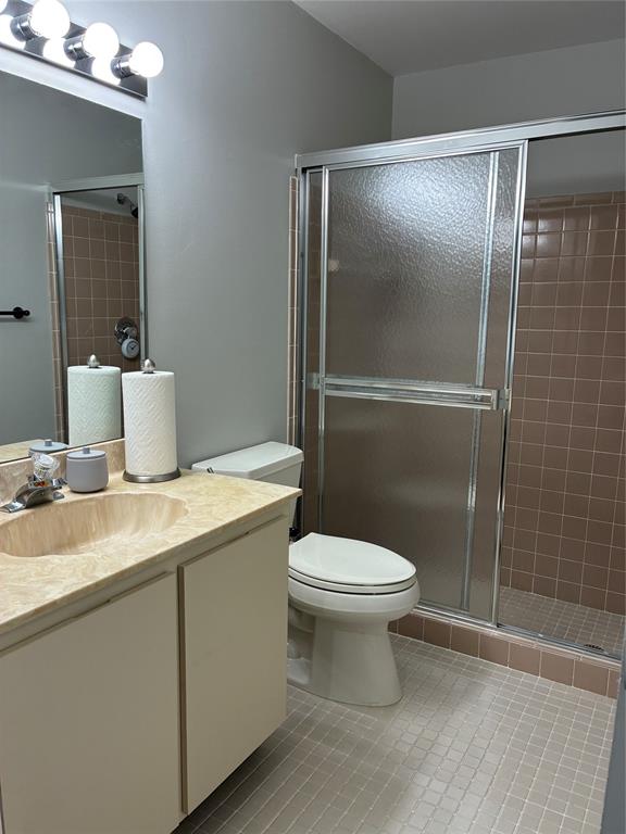 18546 Horizon Avenue, Unit 168 Boca Raton, FL 33496 - Photo 30 of 46 a bathroom with a sink toilet and shower