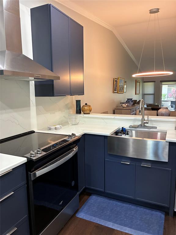 18546 Horizon Avenue, Unit 168 Boca Raton, FL 33496 - Photo 7 of 46 a kitchen with granite countertop a stove and a sink
