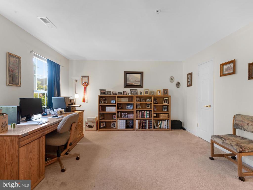 8818 Lew Wallace Road Frederick, MD 21704 - Photo 26 of 38 Bedroom /office on the entry level with attached b