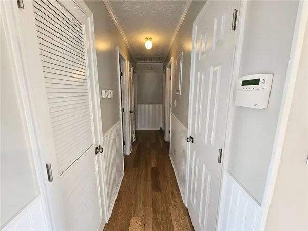 a view of a bathroom from the hallway