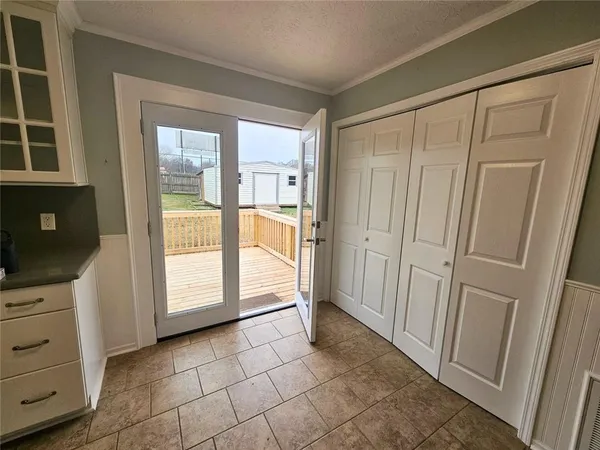 a view of balcony with wooden floor and stairs