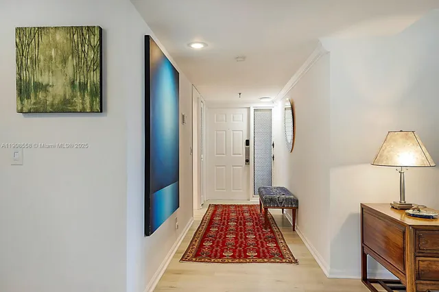 a view of a hallway with a workspace
