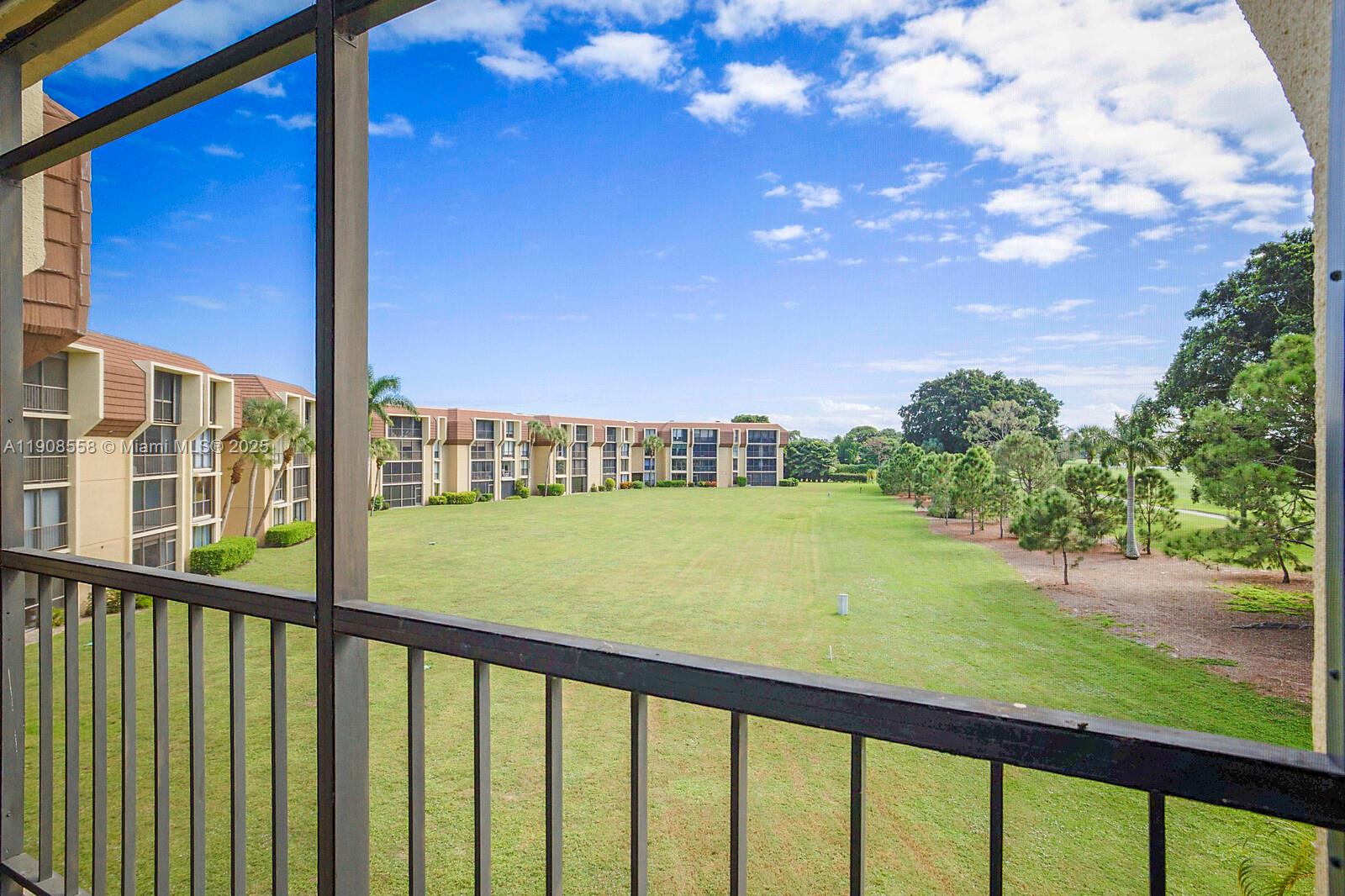 5390 Woodland Lakes Drive, Unit 301 Palm Beach Gardens, FL 33418 - Photo 30 of 34 a view of a balcony with an outdoor space