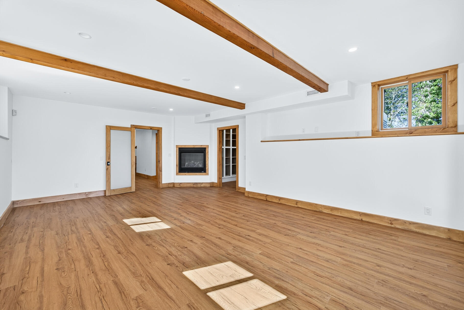 131 Timberlane Drive Mashpee, MA 02649 - Photo 46 of 57 a view of an empty room with wooden floor and a window