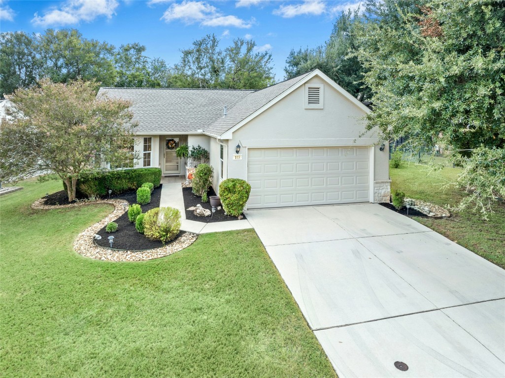 103 Whitewing Way Georgetown, TX 78633 - Photo 1 of 1 a front view of house with yard and green space