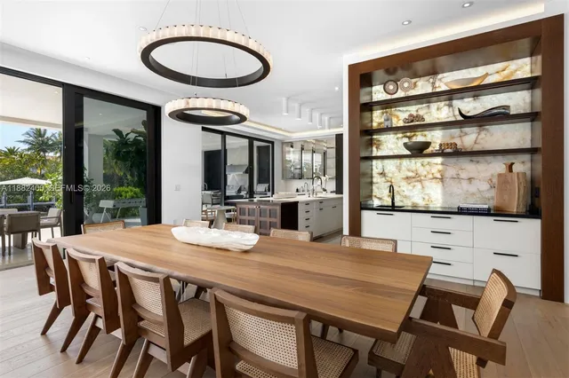 a kitchen with a stove a sink and a refrigerator