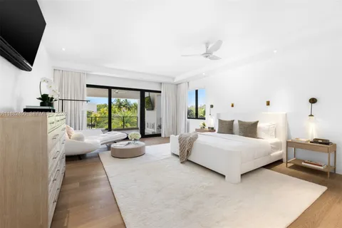 a spacious bathroom with a double vanity sink shower and a mirror