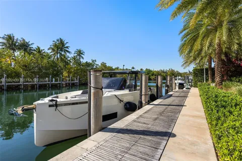 a view of multiple houses with yard