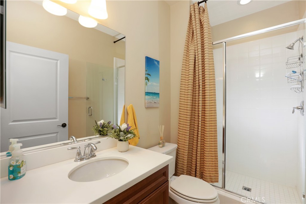 64 Prickly Pear Irvine, CA 92618 - Photo 12 of 35 a bathroom with a sink toilet and shower